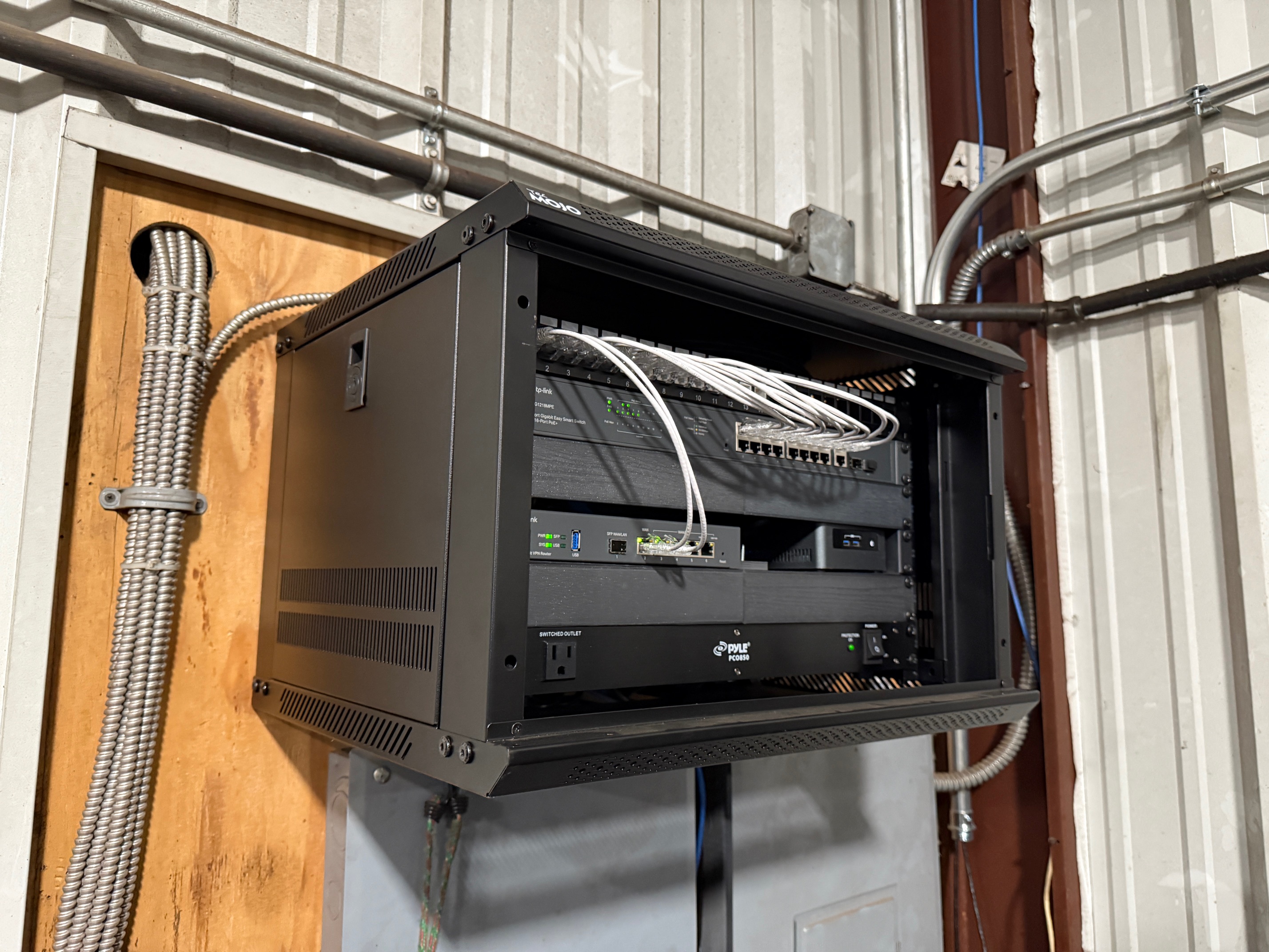 A picture of network cabinet for a wired out job.
